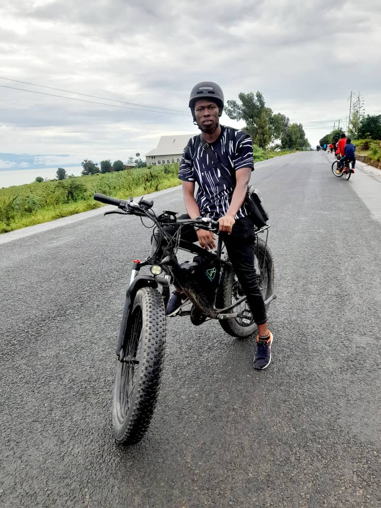 E-fatbike riders on the road above Lake Tanganyika