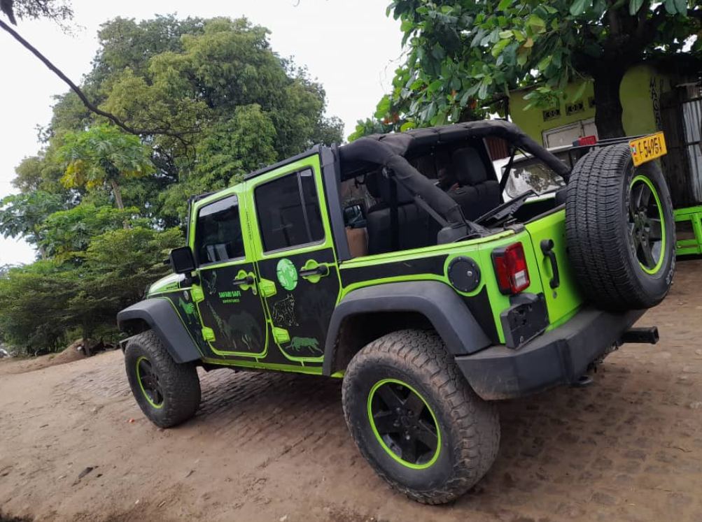 Jeep Wrangler parked on a dirt road in Bujumbura